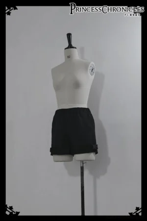 Black cargo inner shorts with adjustable side buckles and elastic waistband techwear design