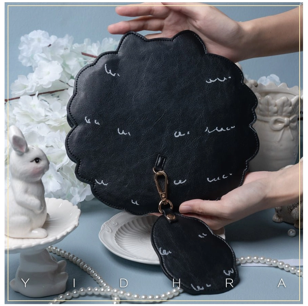 Black cat kawaii shoulder bag flat lay presentation showing bag construction quality and embroidery craftsmanship for gothic lolita