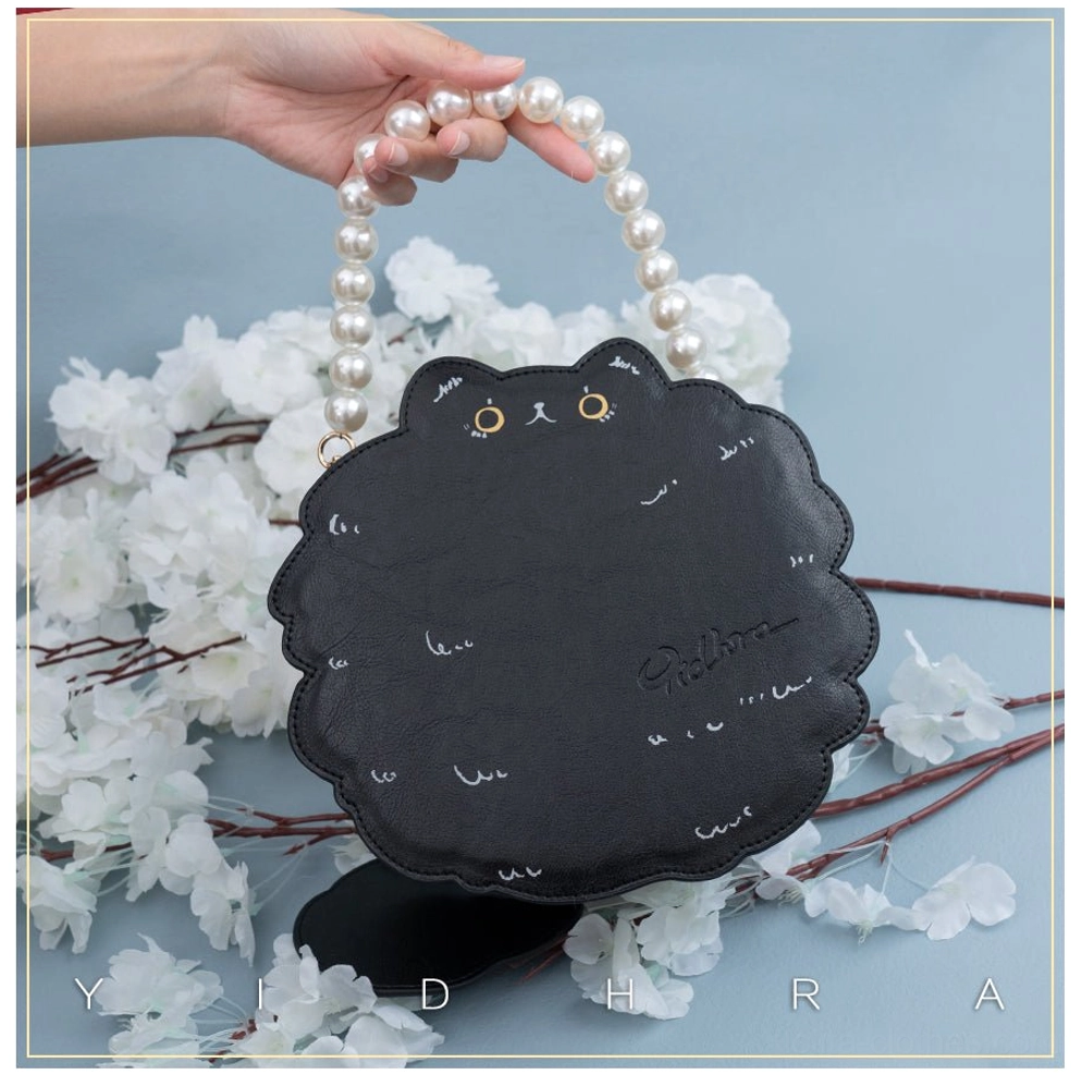 Black cat shoulder bag with pearl portable chain attachment creating luxury lolita accessory for formal events and conventions