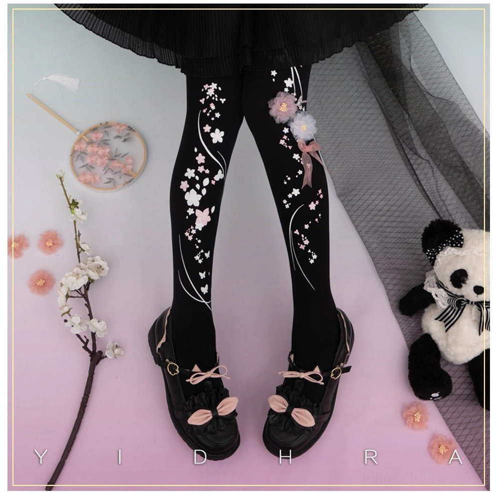 Black cherry blossom qi lolita pantyhose with embroidered vine pattern and fluffy pom-pom flowers front view with black lolita skirt