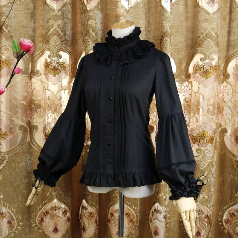 Black classic Lolita blouse front full display on dress form showing complete design with adjustable Hime sleeves, ruffled collar, decorative buttons, and structured silhouette