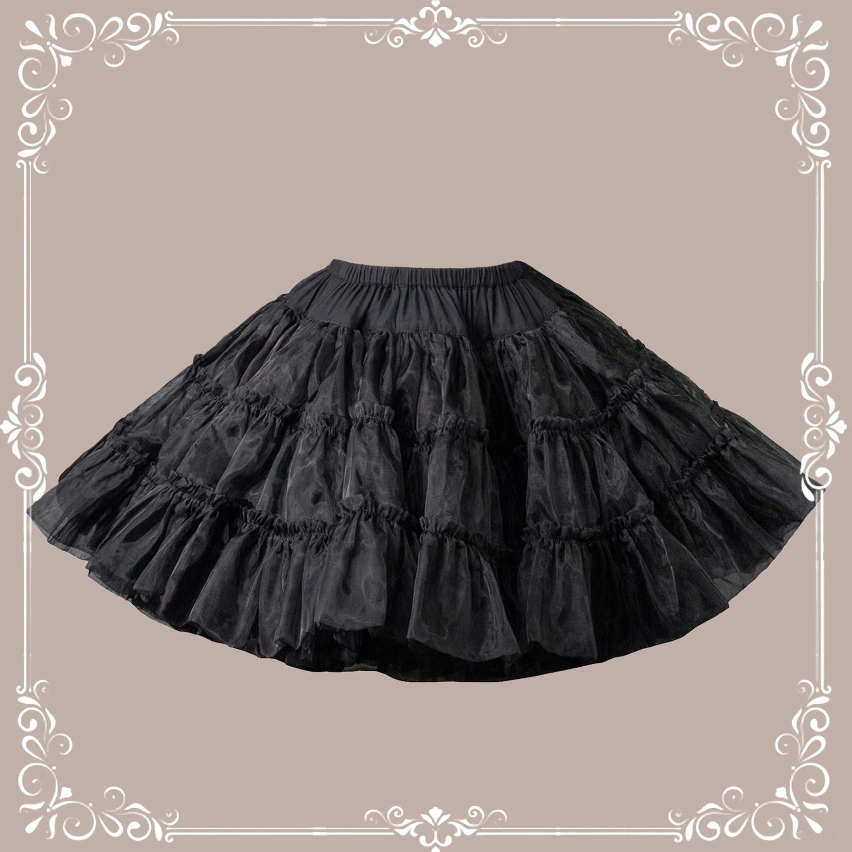 Black extreme puffy lolita petticoat direct overhead flat lay view on light background showing tiered ruffled tulle elastic waistband and shape