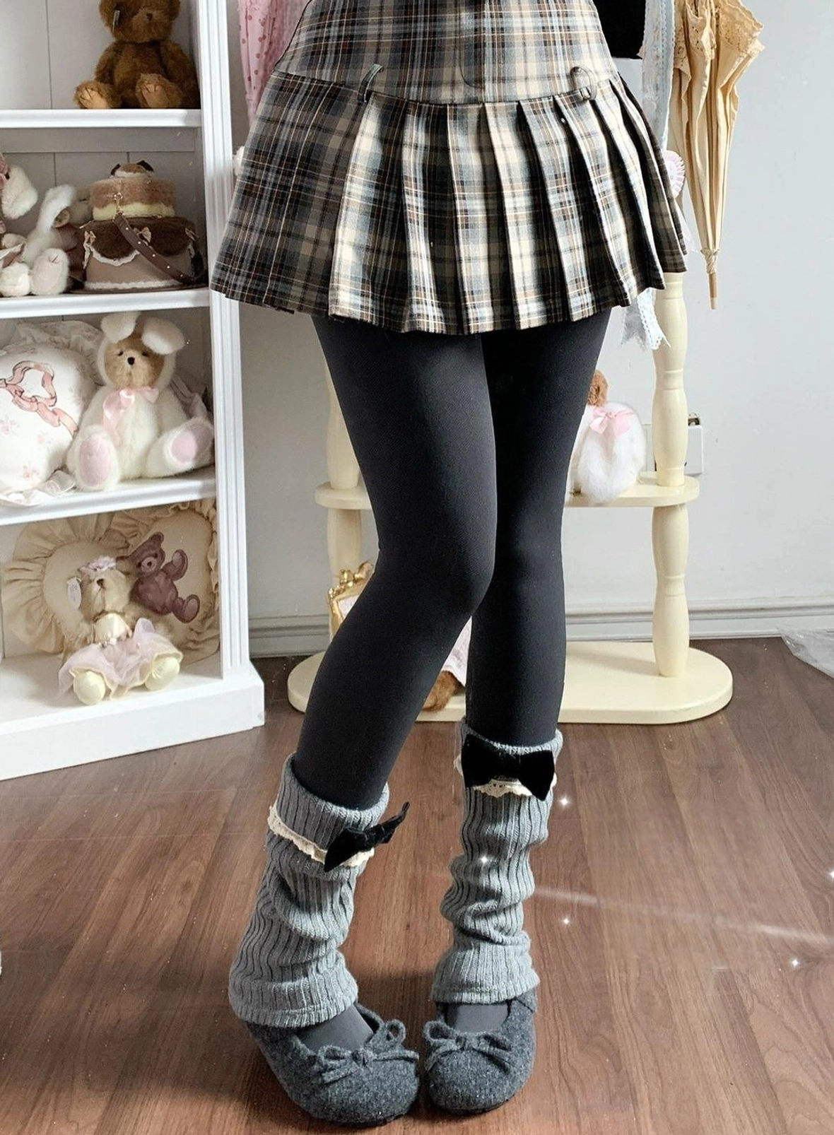Black winter fleece lining lolita pantyhose with gray knit leg warmers black bow and plaid pleated skirt indoor display