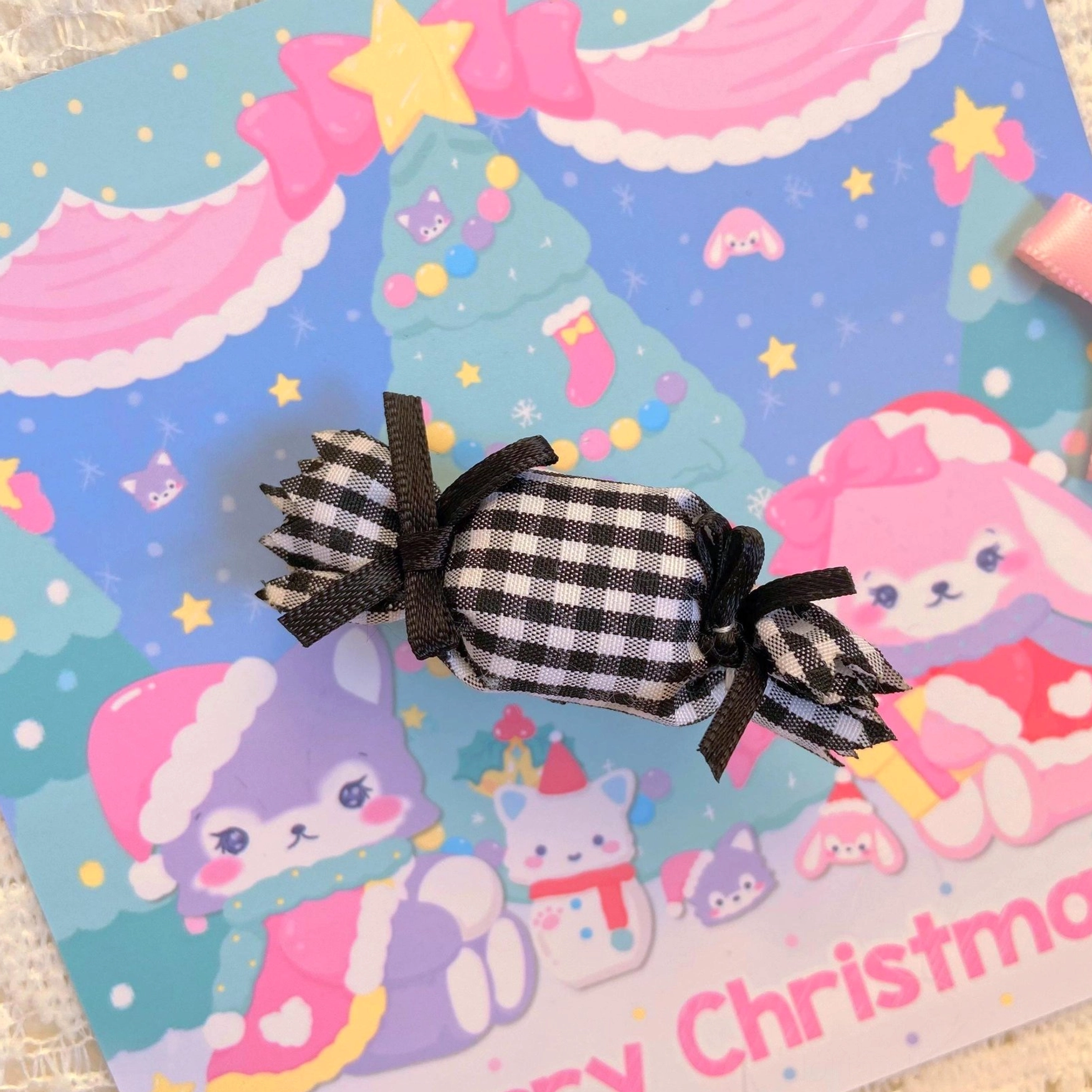 Black gingham candy-shaped lolita hair clip with plaid pattern and black ribbon bow, gothic headdress accessory for dark and classic coordinates