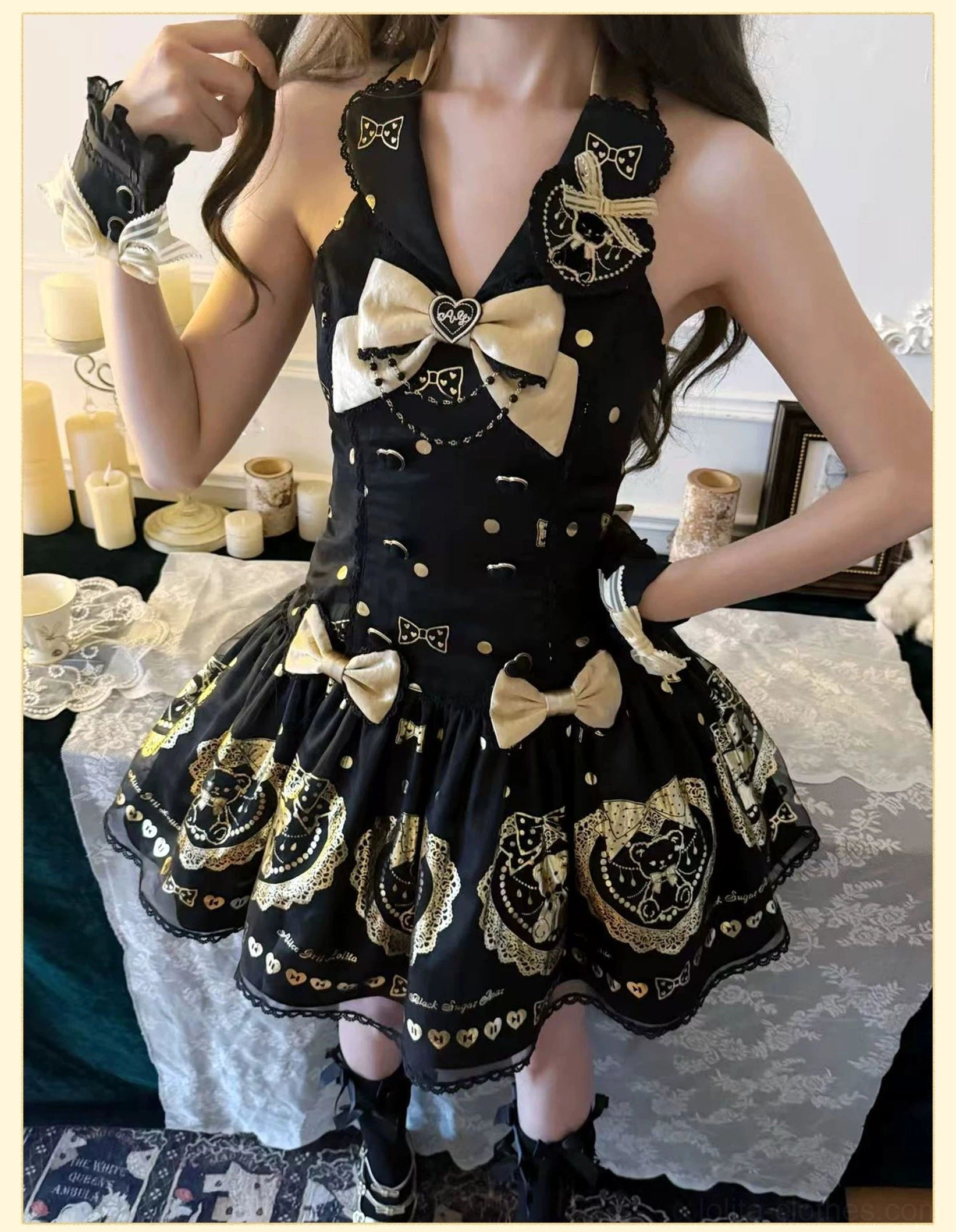 Atmospheric lifestyle photography of model wearing black and gold bear print lolita dress in thematic setting, showcasing how dress complements old school lolita fashion aesthetic and culture