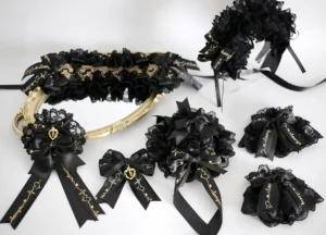 Complete black and gold lolita accessories set flat lay studio shot including bonnet hairpins bows choker and wrist cuffs unified black and gold color tone