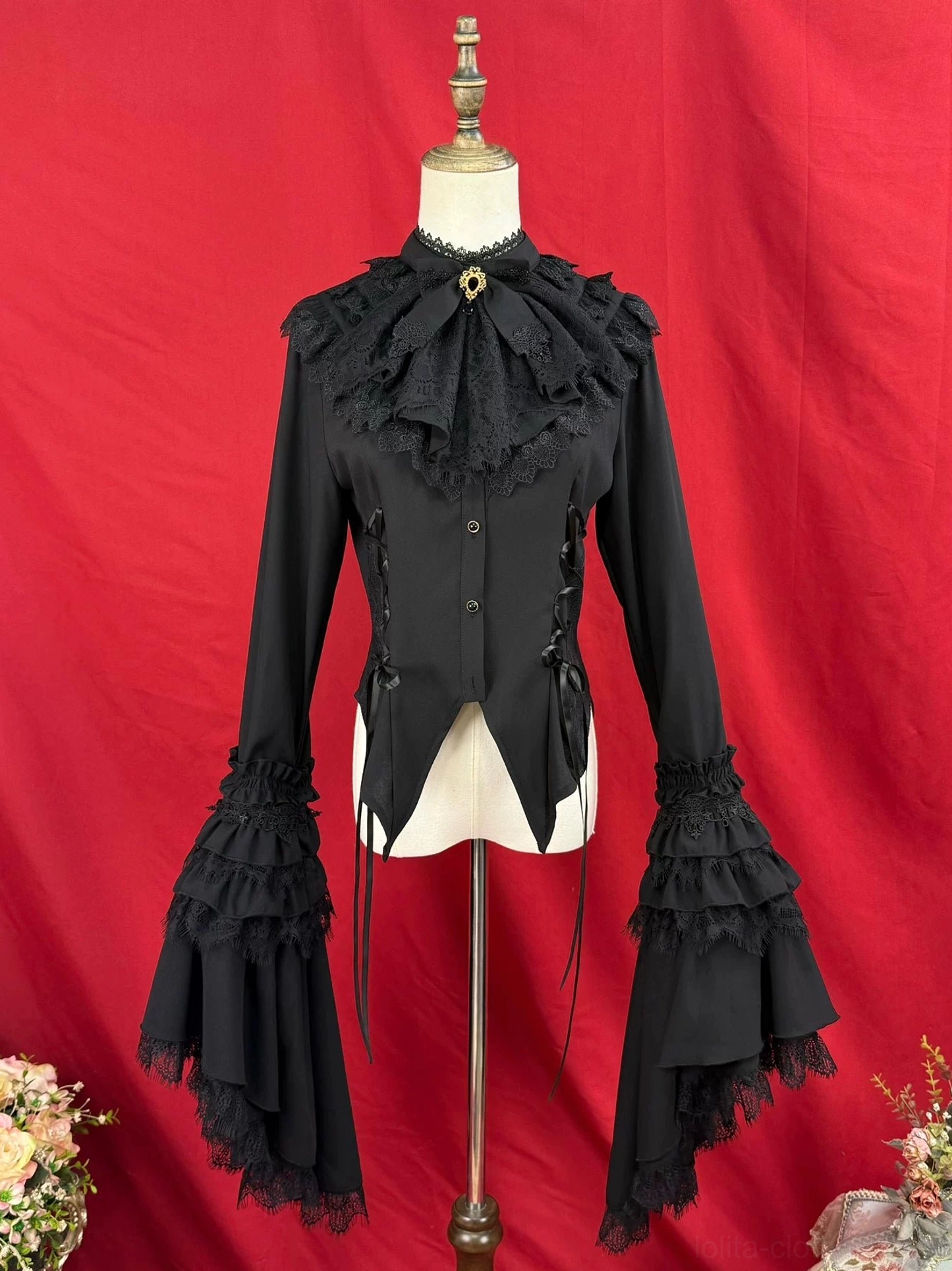 Black Gothic Lolita blouse with ruffled lace jabot tiered bell sleeves and bat-wing asymmetrical hem front display
