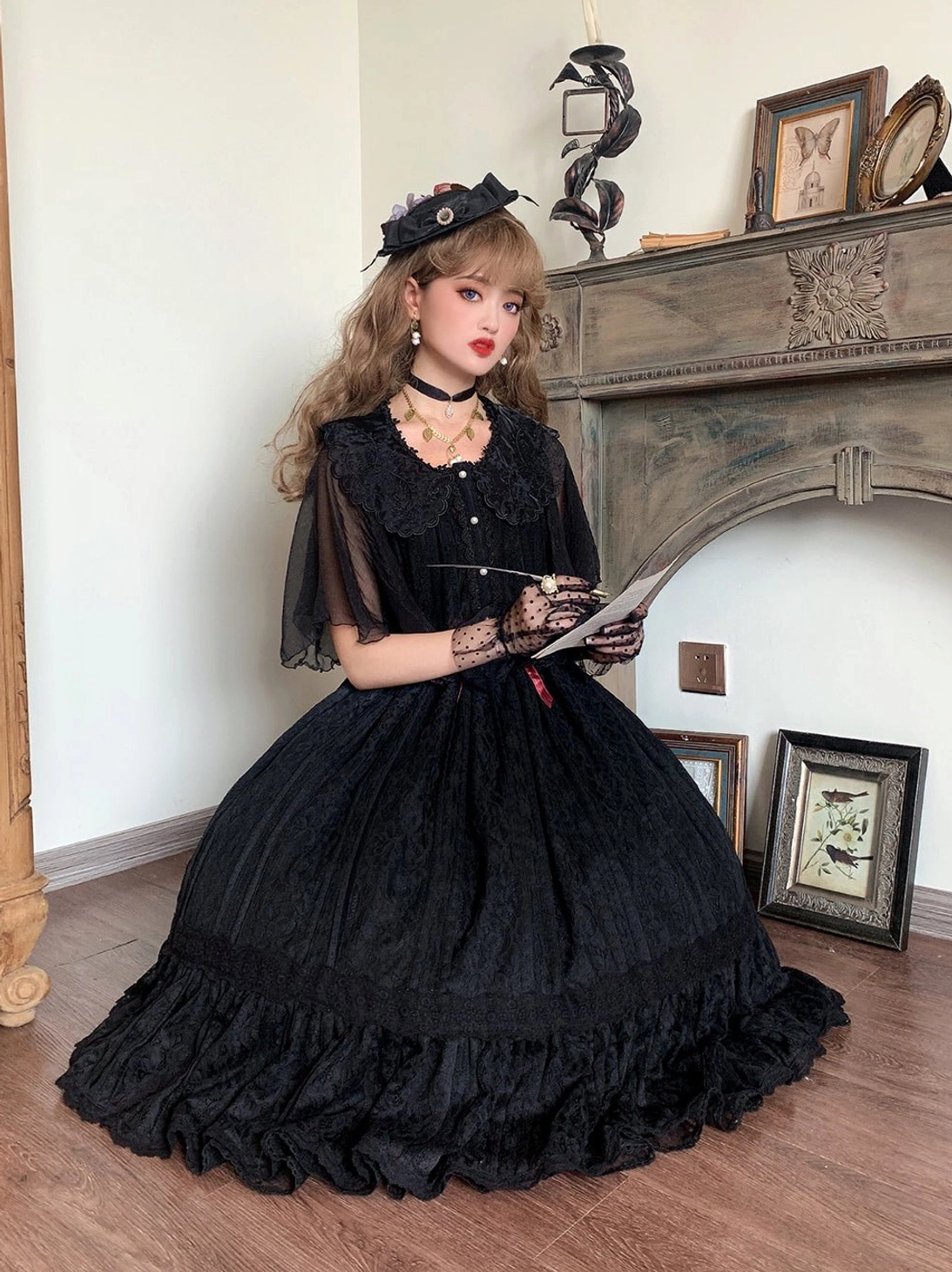 black gothic lolita blouse set with lace collar sheer sleeves and decorative hemline formal look