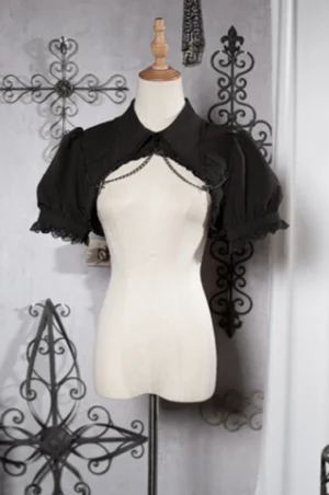 Black gothic lolita cropped bubble bolero with puff sleeves lace trim metal chain chest decoration tailored lapel collar front flat view on dress form