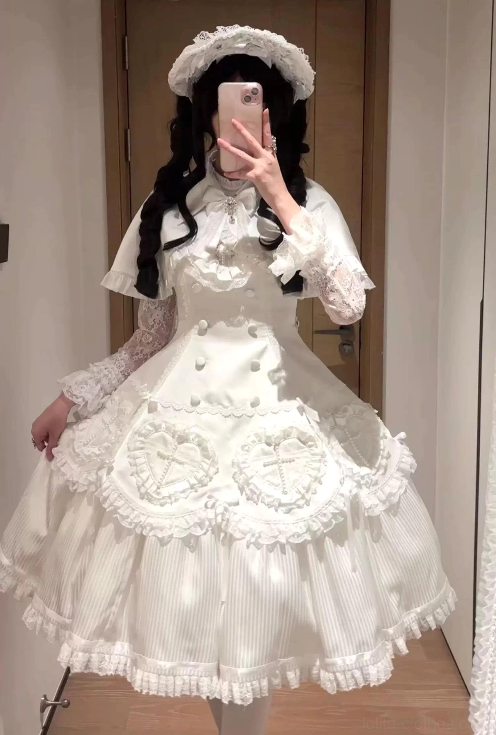 Black Gothic Lolita OP dress with extended hem option full-length floor view dramatic regal styling formal occasion appearance