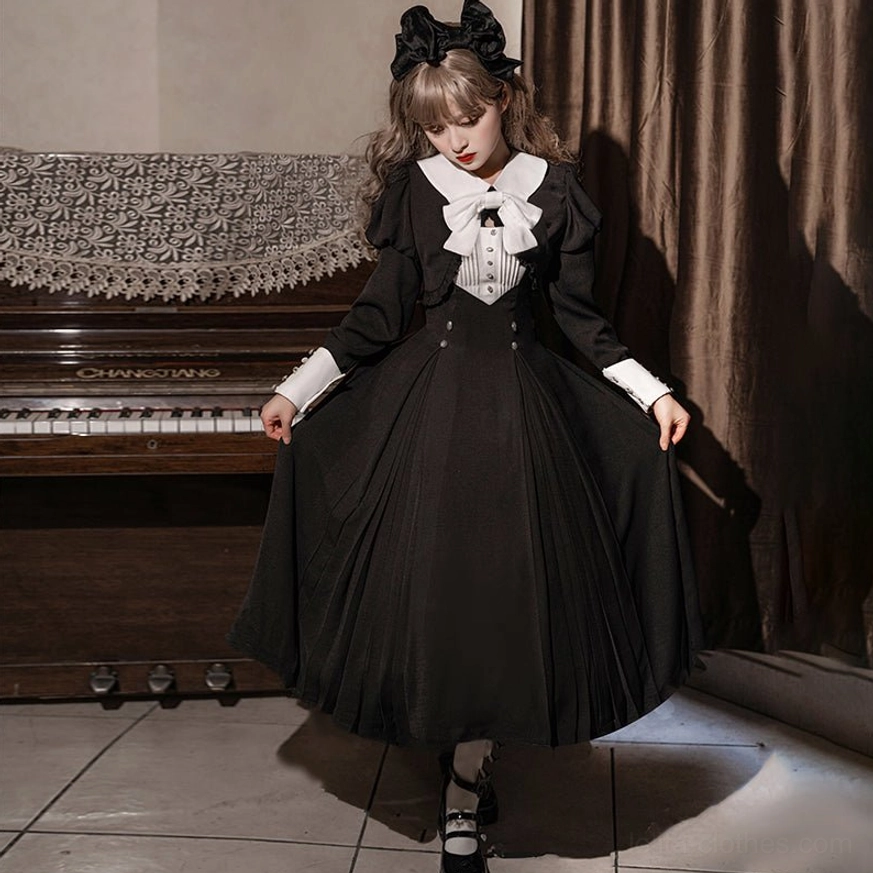Black Gothic Lolita one-piece dress photographed from side angle in retro piano room, showcasing high-waisted buttoned waist, puffed long sleeves, pleated skirt, fishnet stockings