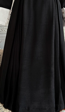 Black Gothic Lolita dress styled with traditional Lolita footwear, accessories, and hair pieces demonstrating complete coordinate outfit for fashion enthusiasts