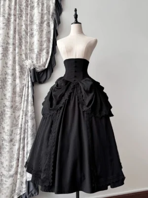 Black gothic lolita fishbone bustle skirt with front buttons and lace ruffled hem on dress form frontal view