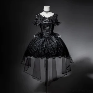 Black gothic lolita JSK dress on mannequin displaying front structure, corset-style bodice with ruffled lace neckline, glittery voluminous skirt with high-low tulle overlay