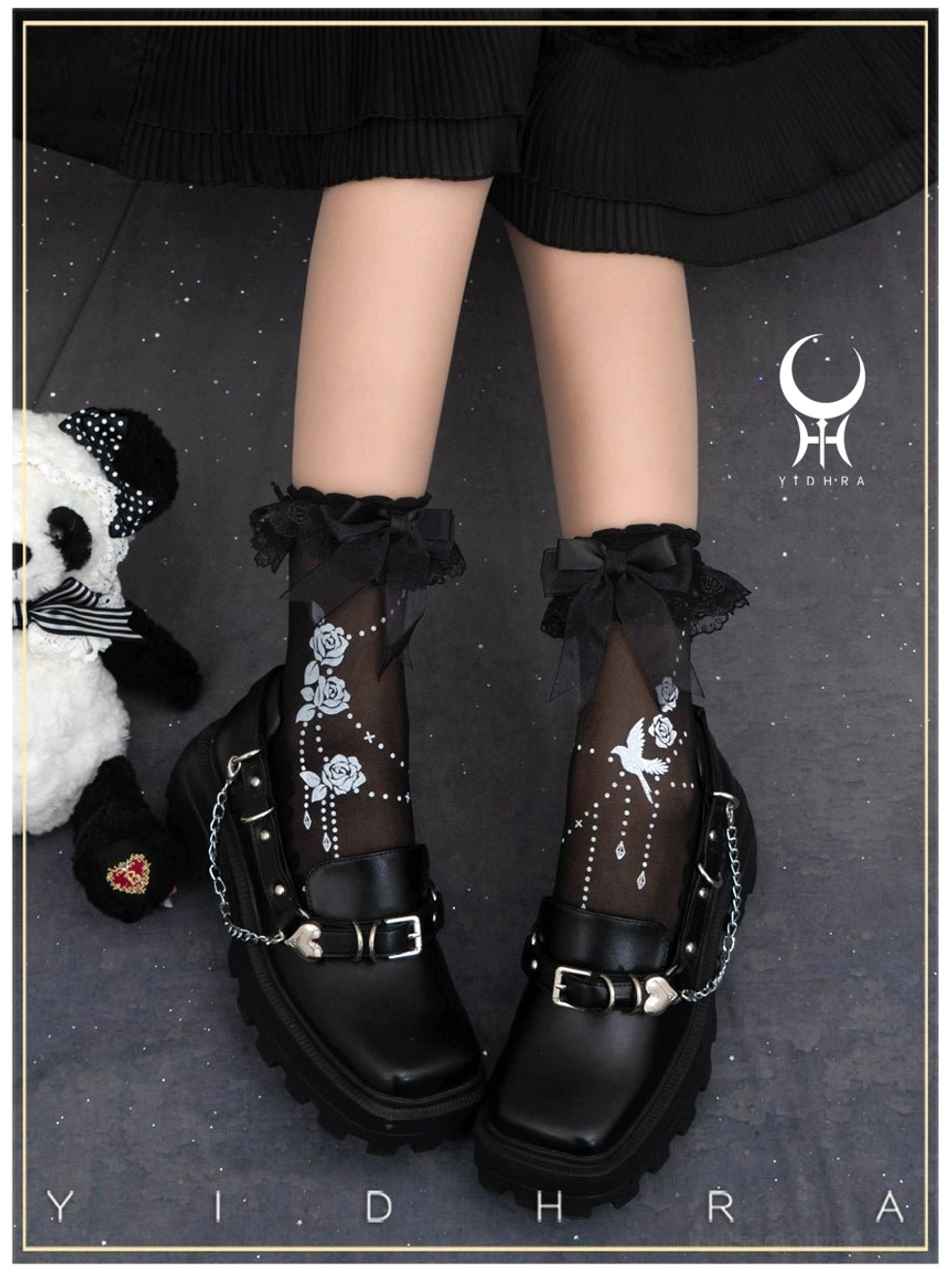 Black sheer Lolita ankle socks with ruffled lace cuff trim paired with platform leather loafers and panda toy floral bird printed patterns