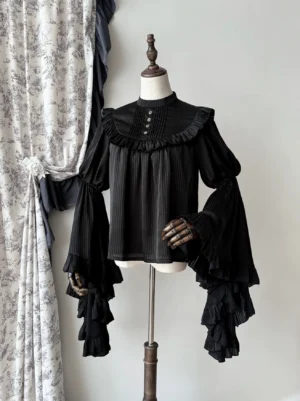 Black gothic lolita princess sleeve blouse with vertical striped pattern and ruffled yoke detail, front full view on dress form