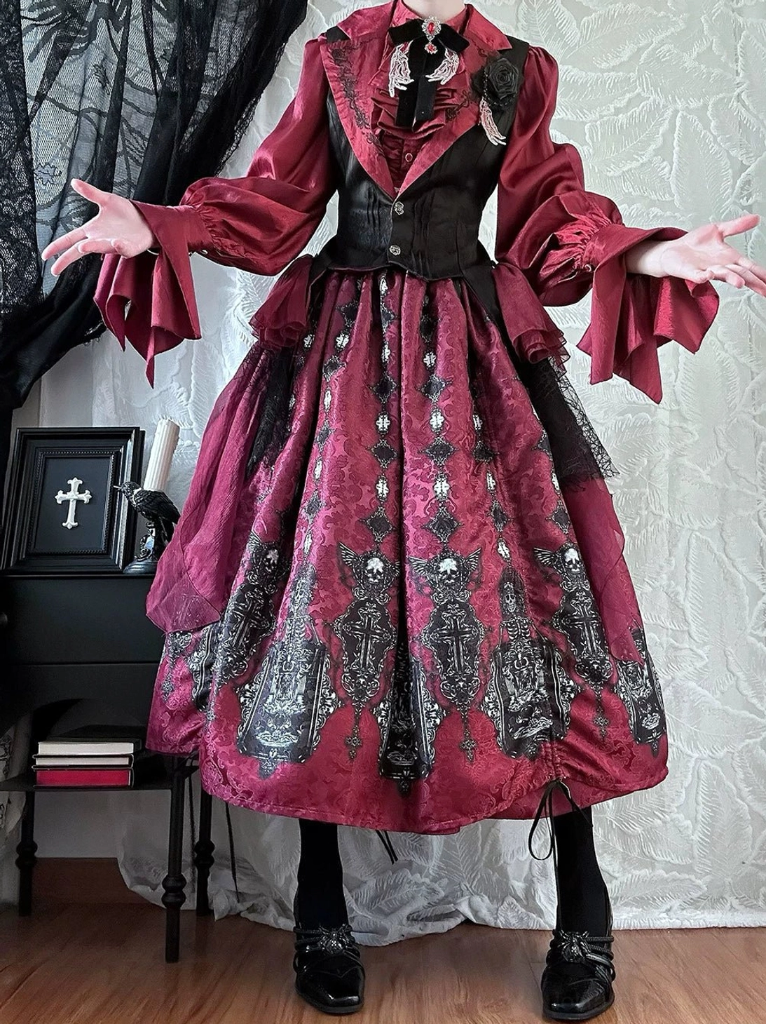 Black Gothic Lolita waistcoat with golden button closure and jacquard fabric texture detail