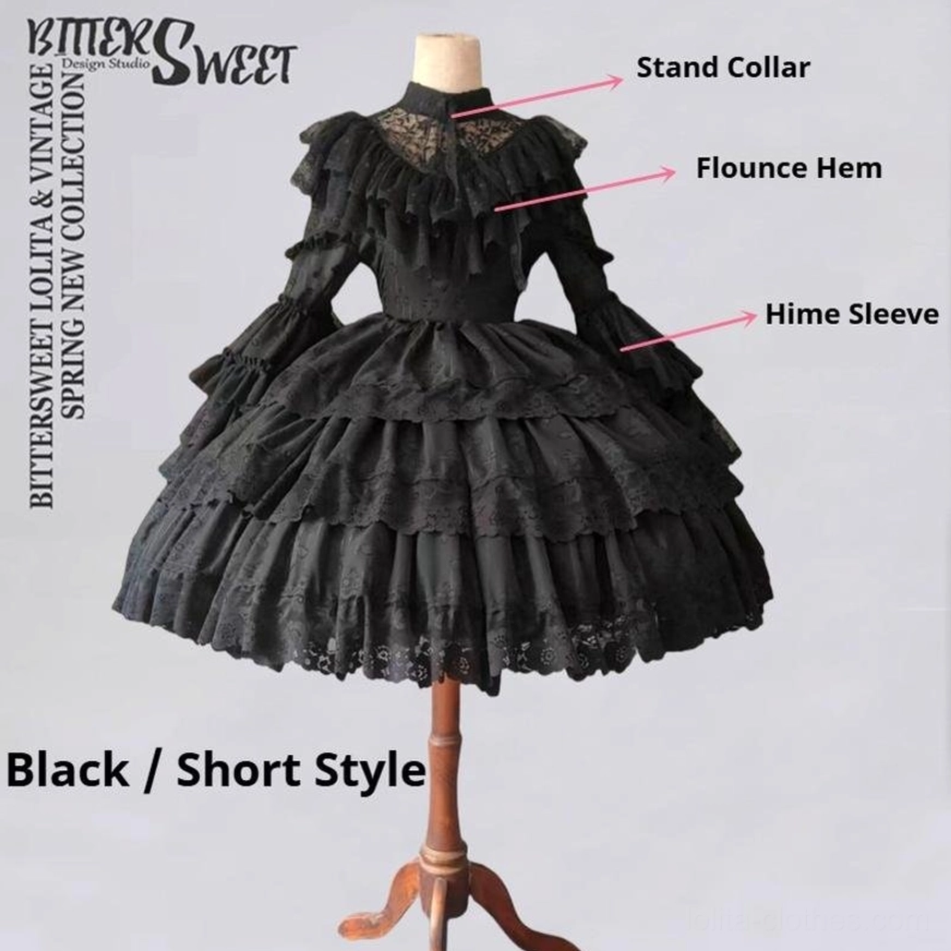 Black Short Style Gothic Lolita Wedding Dress detailed front view showing stand collar architecture hime sleeves and flounced hem on wooden dress stand