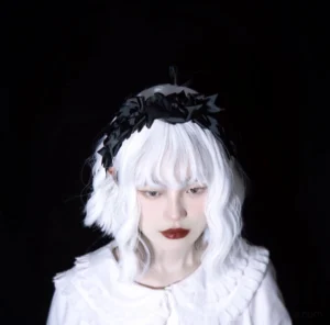 gothic-lolita-black-organza-kc-hairband-overhead-front-view-showcasing-satin-bow-decorations
