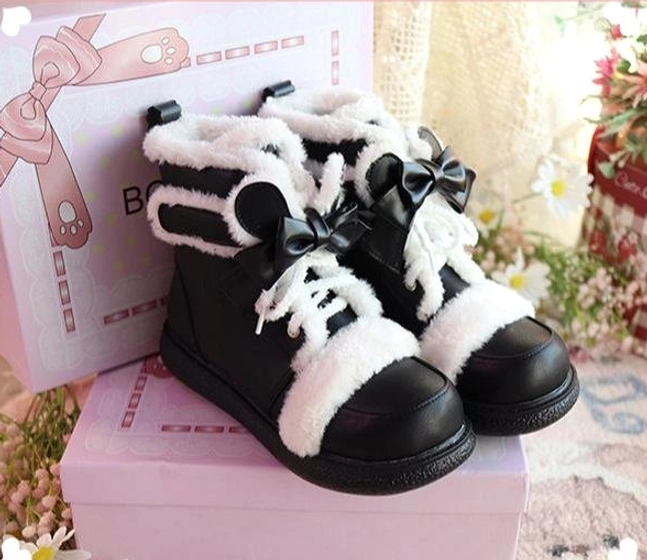 Black lolita winter ankle boots with white plush fleece trim and decorative bow details, complete product shot showing gothic lolita style boot