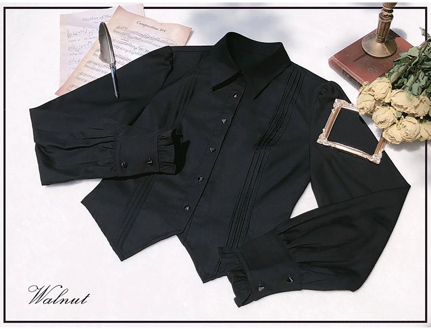Black lolita blouse with pleated front panel, heart-shaped buttons, and ruffled long sleeves featuring white ruffle cuffs - paired with red plaid JSK jumper skirt upper body detail