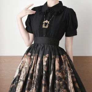 Black vintage Lolita short-sleeve blouse with puff sleeves and lace cuffs paired with printed lolita skirt half-body front wearing shot