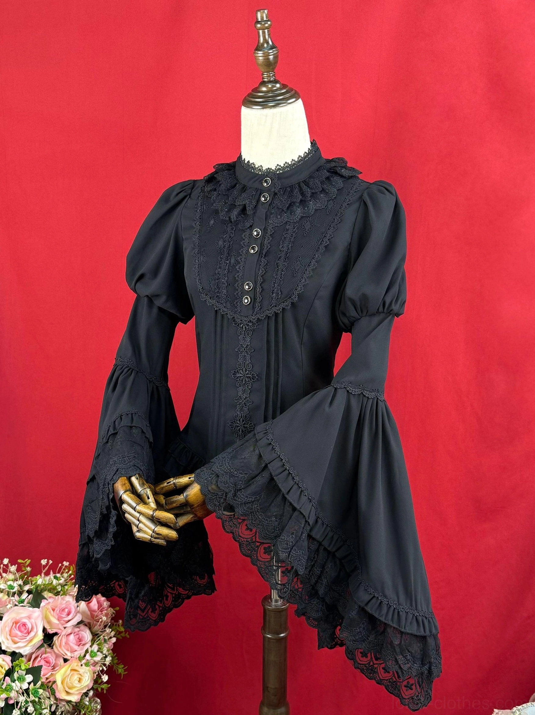 Black classic Lolita blouse front view with ruffled stand collar front lace placket and large lace-trimmed trumpet sleeves