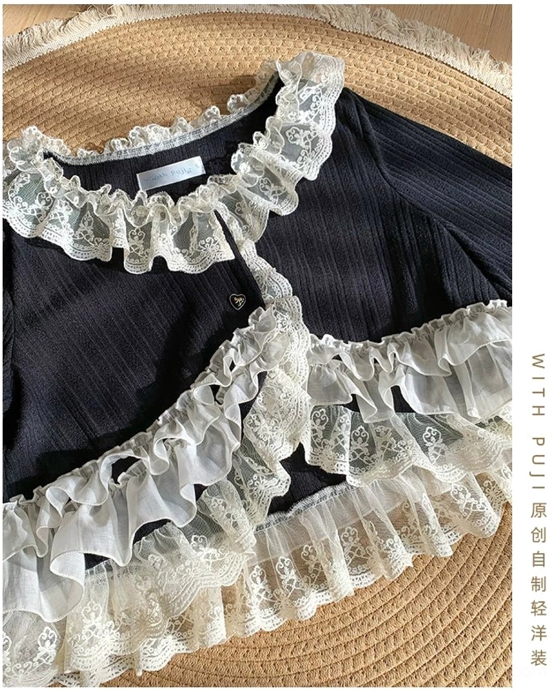 Black lolita bolero with intricate layered lace trim detailing on collar and long sleeves, lightweight knit fabric perfect for spring autumn wear
