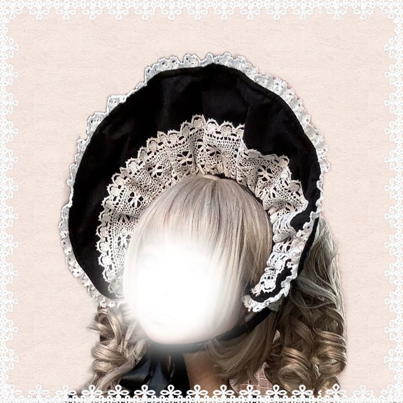 Detail photograph of black lolita bonnet tie or BNT accessory showing ribbon construction, lace embellishment, and coordinating design with main OP dress