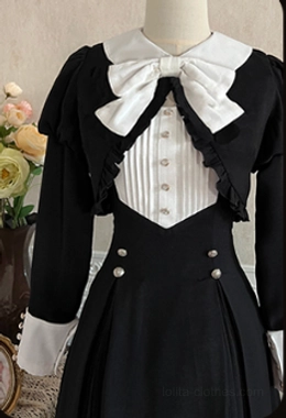 Black Gothic Lolita OP dress sleeve detail highlighting puffed long sleeve construction, white crepe-de-chine cuff, and sleeve proportions typical of authentic Lolita design