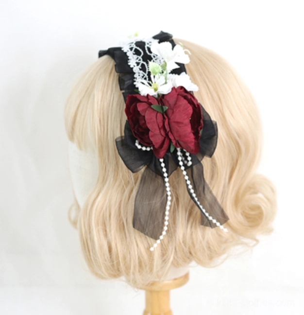 Black elegant lolita floral lace headband with retaining clip displayed on mannequin model