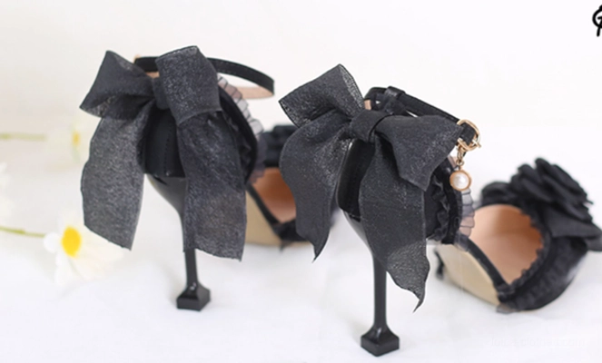 Black Lolita high heel sandals back side flat lay view sole mesh bow heels with pearl pendants on ankle straps