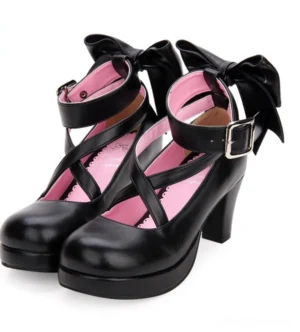 Black lolita high heel shoes with crisscross straps and oversized back bow showing pink silk lining detail in front three-quarter paired display