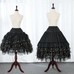 Black lolita hoop petticoat front double view on wooden display stands with tiered ruffles and glitter star tulle hem with hanging bead tassel trim