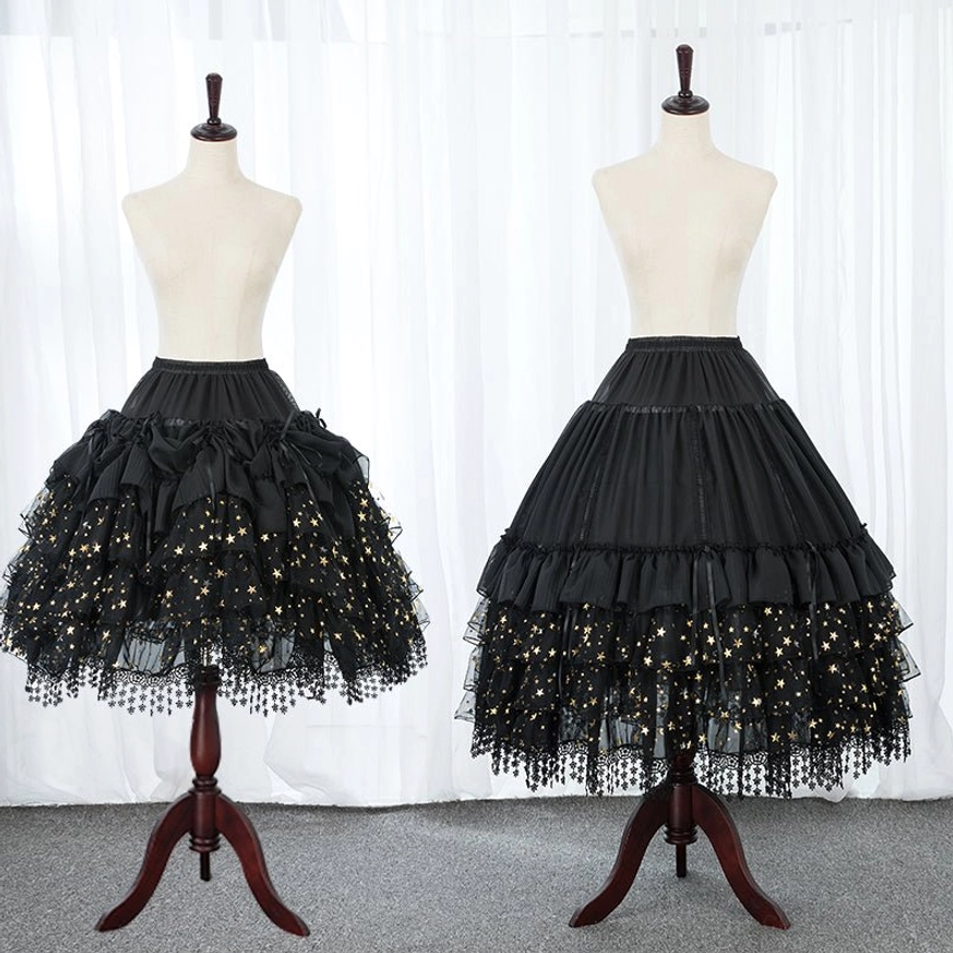 Black lolita hoop petticoat front double view on wooden display stands with tiered ruffles and glitter star tulle hem with hanging bead tassel trim