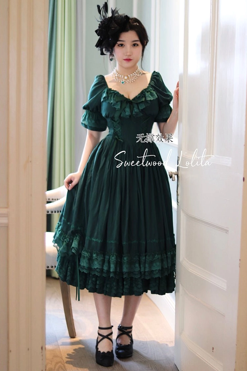 Black French Lolita one-piece dress long version showing gothic elegant aesthetic with voluminous skirt