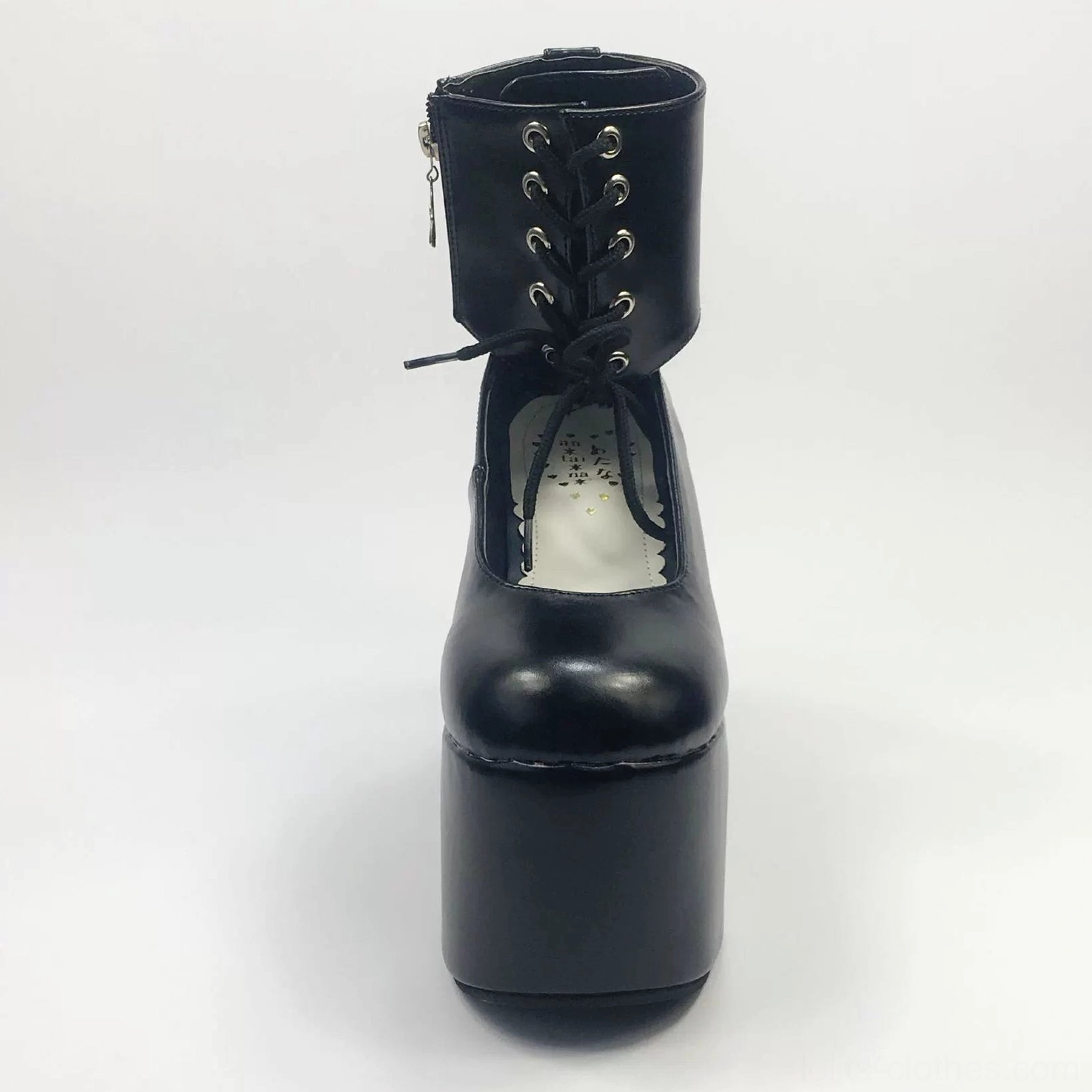 Black lolita platform ankle boot direct frontal view showing visible decorative insole, lace-up ankle collar with eyelets, super thick platform block heel and glossy black PU leather finish