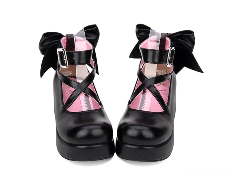 Black round toe Lolita platform shoes flat front view with crisscross straps pink inner lining metal buckle