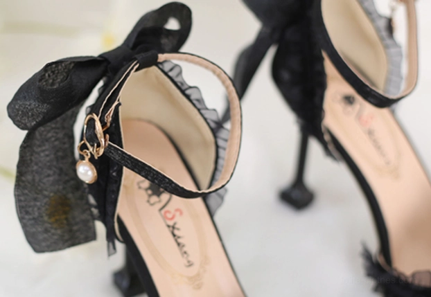 Black Lolita high heel shoes close up back view stiletto heel mesh bow pearl pendant ankle strap hardware detail