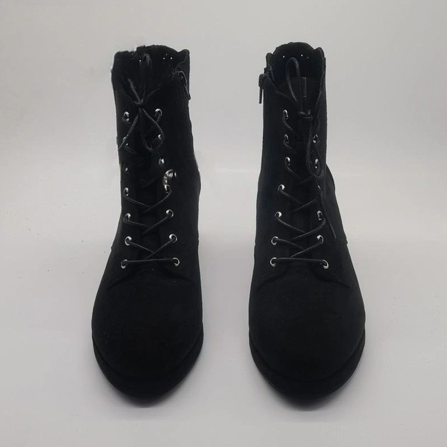 Direct frontal display of all-black suede Lolita ankle boots pair with classic lace-up metal eyelet closure, clean rounded toe shape, and sturdy block heel platform