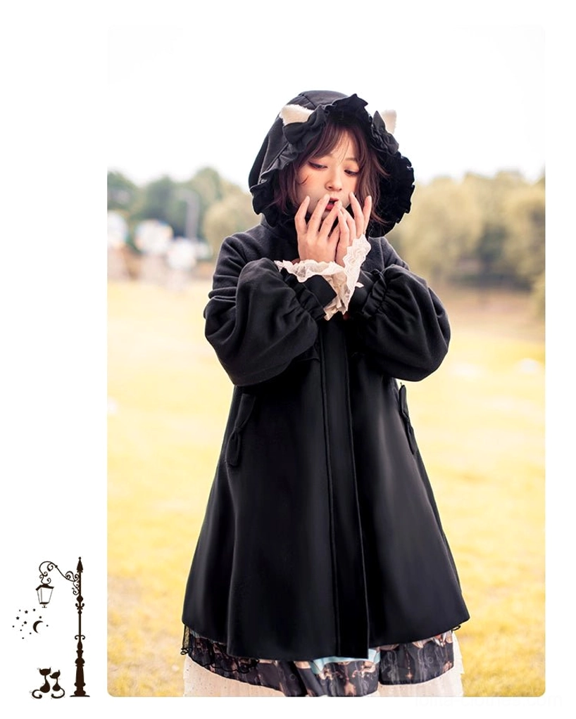 Black lolita winter coat with black cat ears full body front standing pose urban outdoor backdrop romantic silhouette