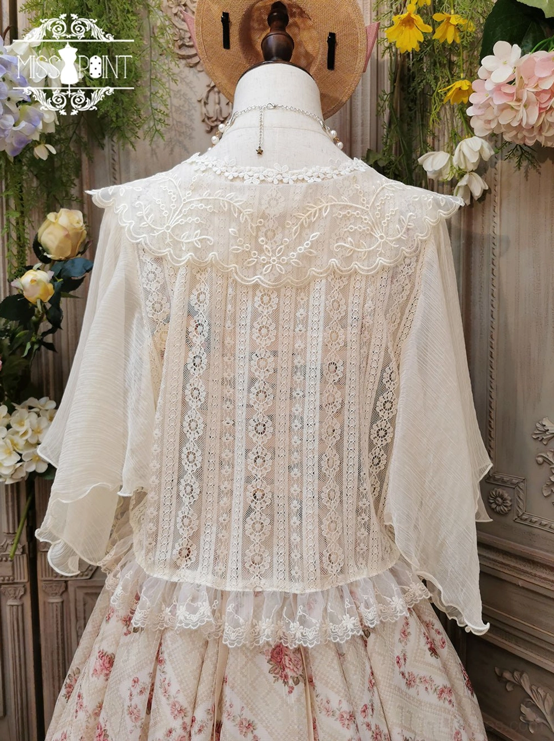 black long sleeve lolita blouse with lace hemline and hollowed-out front back design detail