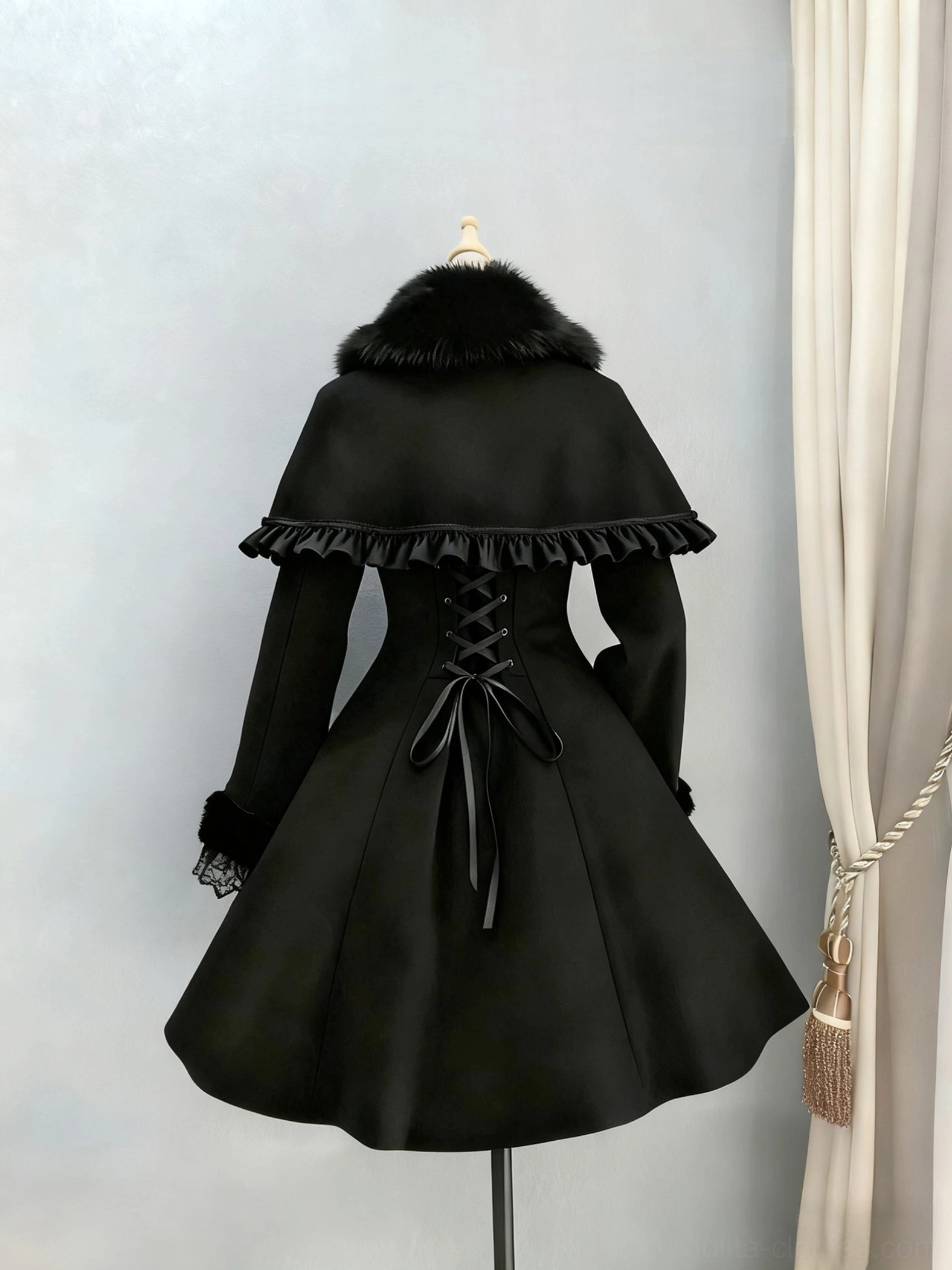 Black wool Lolita coat back view lace-up corset back detail flared A-line hem ruffled cape
