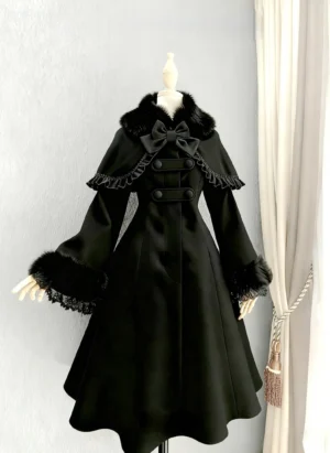 Black wool Lolita coat with detachable faux fur collar and ruffled cape front view dress form display