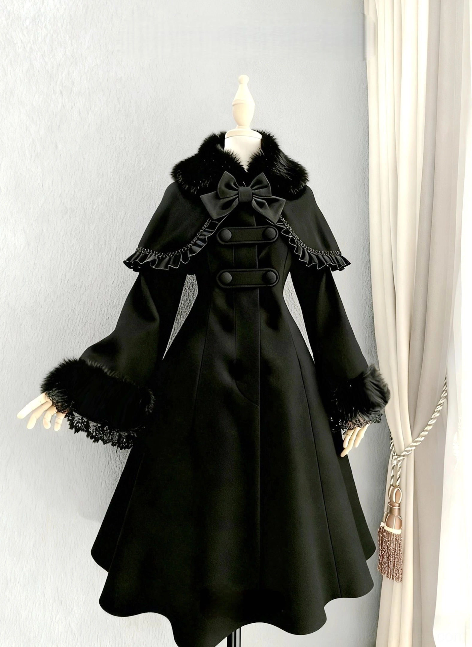 Black wool Lolita coat with detachable faux fur collar and ruffled cape front view dress form display