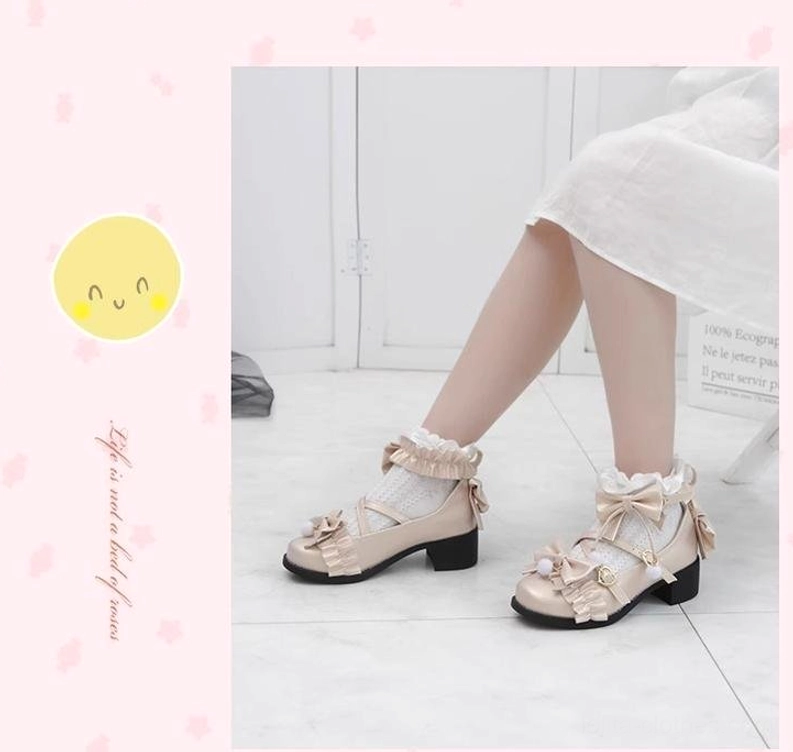Classic Lolita coordinate styling featuring black matte Lolita Mary Jane shoes paired with structured JSK, refined accessories, and elegant leg wear for sophisticated aesthetic