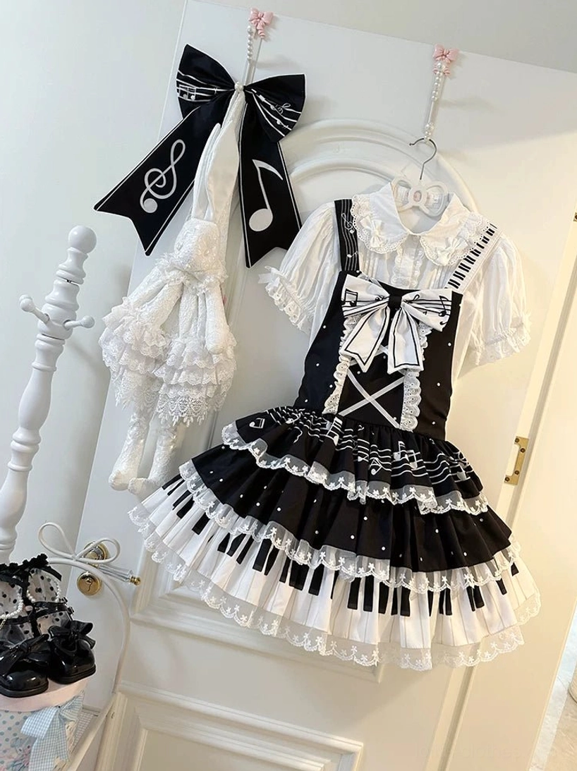 Black Musical Motif Old School Lolita Salopette JSK with Layered Lace Piano Key Print and White Front Chest Bow - Full Front Hanging Display