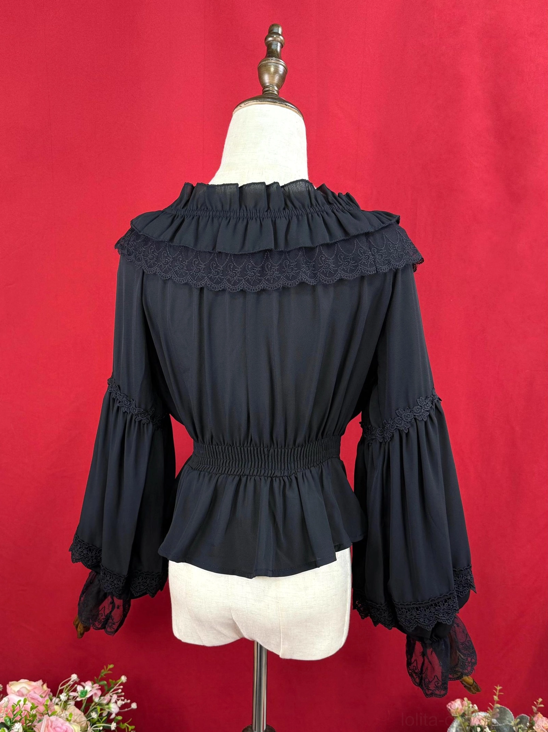 Black off-shoulder Lolita blouse back view showing ruffled lace yoke elasticated waist and lace-trimmed bell sleeves back detail