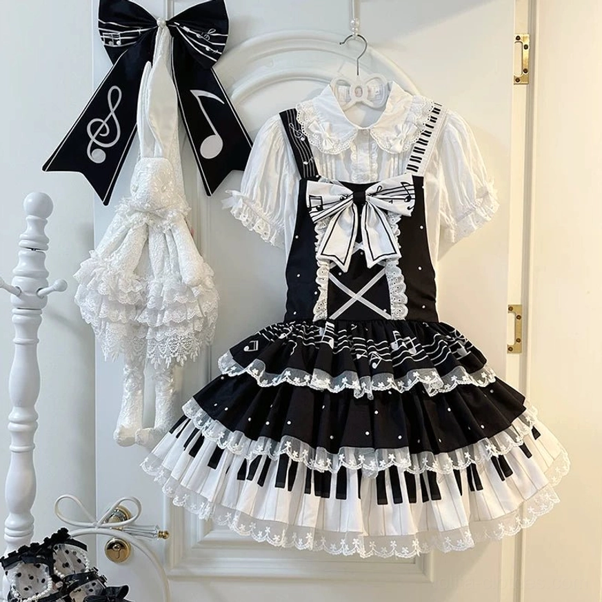 Black Old School Lolita Salopette Dress with Piano Key Tiered Lace Hem and White Front Bow - Front View Display with Matching Lolita Accessories
