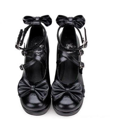 Black pearl sweet Lolita platform Mary Jane shoes front flat lay with dual heart buckle straps front bow accent and thick platform sole